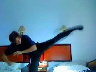 Practicing martial arts kicks