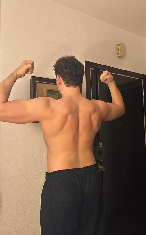 Back muscles gained through consistent home workouts using resistance bands