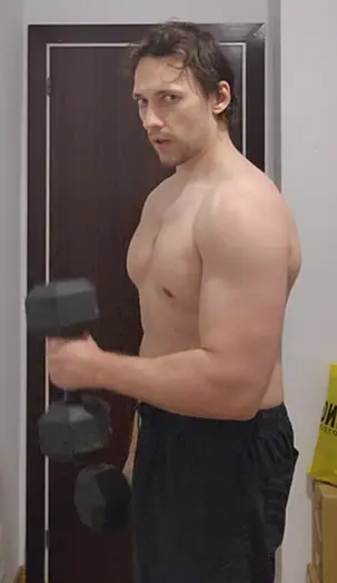 Focused on a dumbbell shoulder workout to build strong, stable shoulders at home. A key exercise for upper body strength and posture improvement